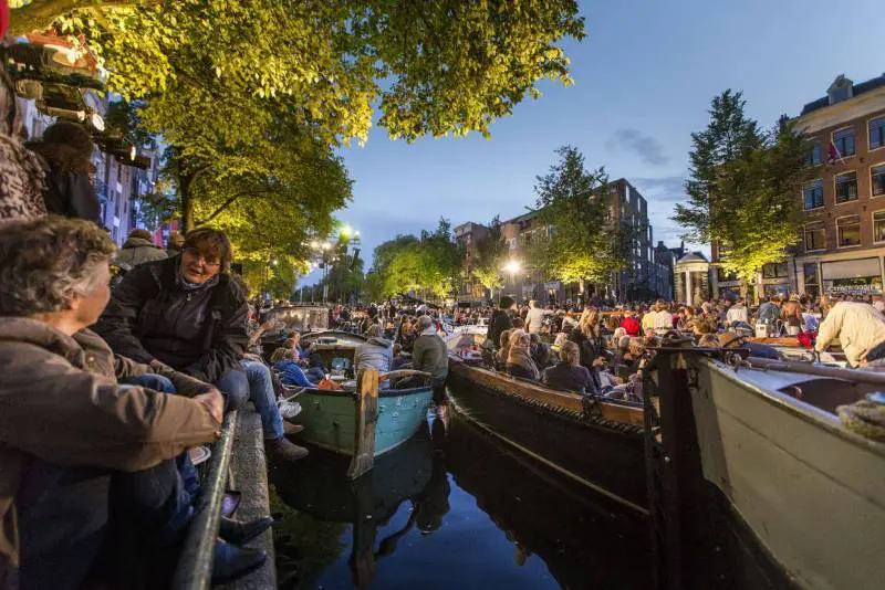 Barcas no canal de Prinsengracht, em Amsterdã, durante o Grachtenfestival. MERTEN SNIJDERS (GETTY)