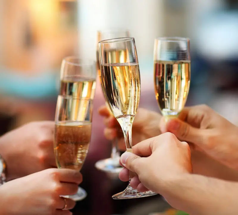 Celebration. People holding glasses of champagne making a toast